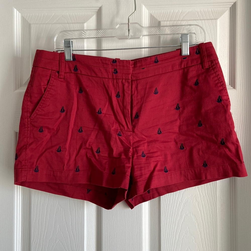 Red shorts with blue sailboats